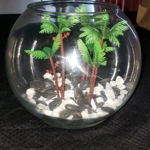 Glass Fish Tank with Plastic Plants and Rocks.